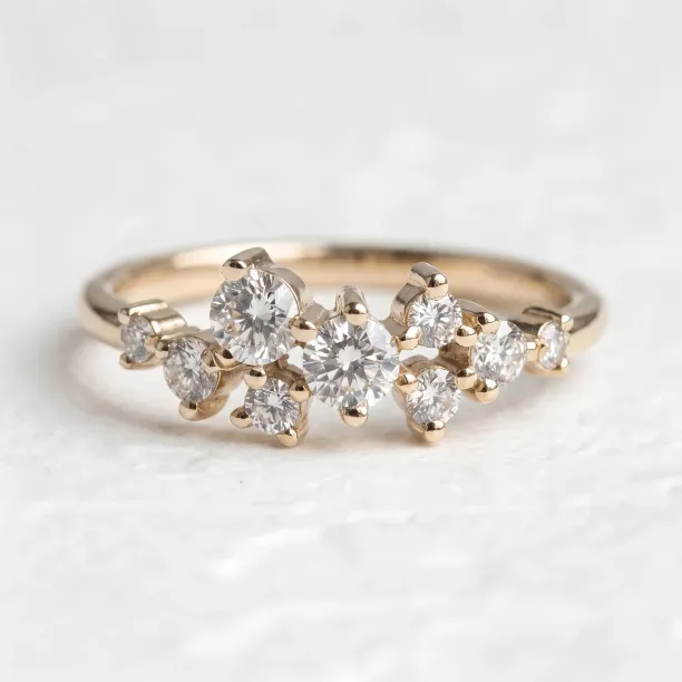Close-up of CLORÉ gold cluster ring with natural or lab-created diamonds