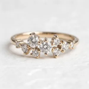 Close-up of CLORÉ gold cluster ring with natural or lab-created diamonds