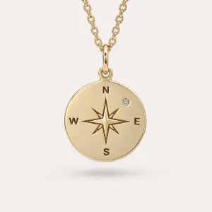 Gold pendant with a compass and a diamond MAP
