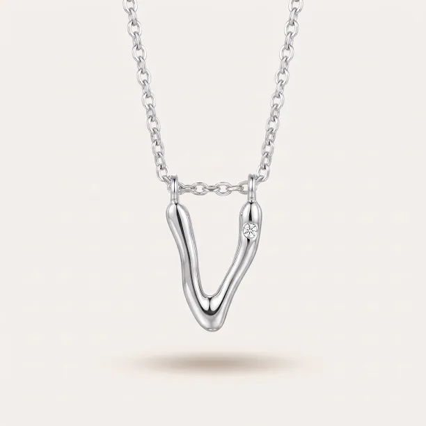 Gold letter pendant with diamond JEAN