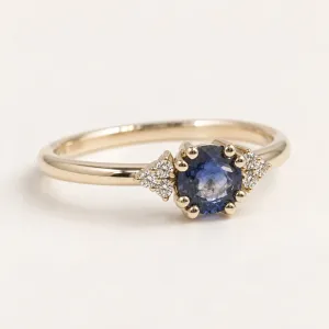 Gold ring with round sapphire and diamonds MONNY