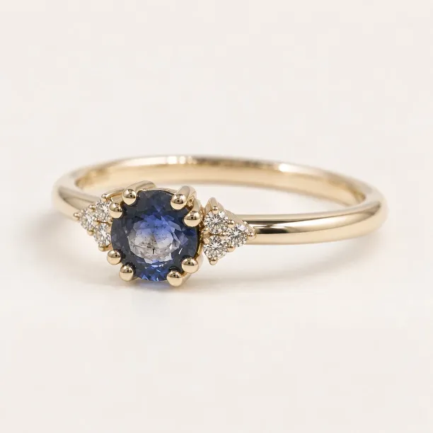 Gold ring with round sapphire and diamonds MONNY