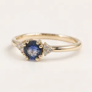 Gold ring with round sapphire and diamonds MONNY