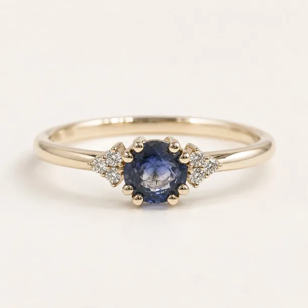 Gold ring with round sapphire and diamonds MONNY