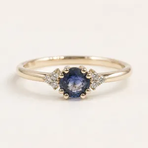 Gold ring with round sapphire and diamonds MONNY