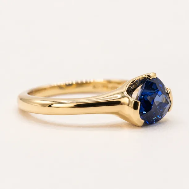 Gold ring with natural sapphire in half bezel setting SOREN